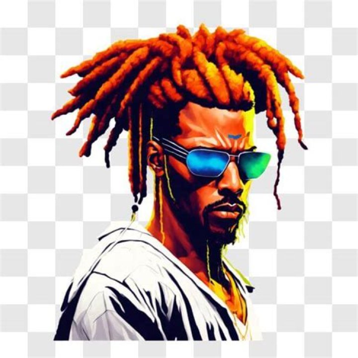 Download A Man With Dreadlocks Standing In Front Of A River
