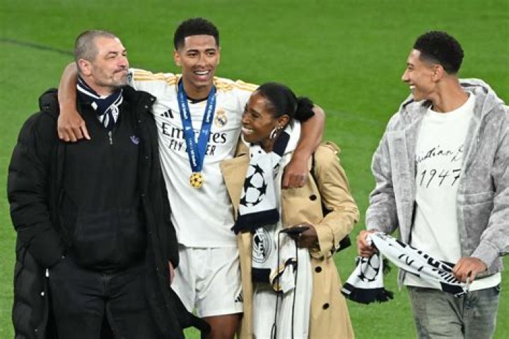 Family photo of Jude Bellingham with parents and brother at Real Madrid