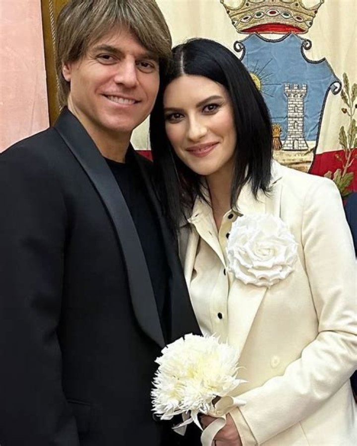 Insider Scoop On Laura Pausini And Paolo Carta's Relationship