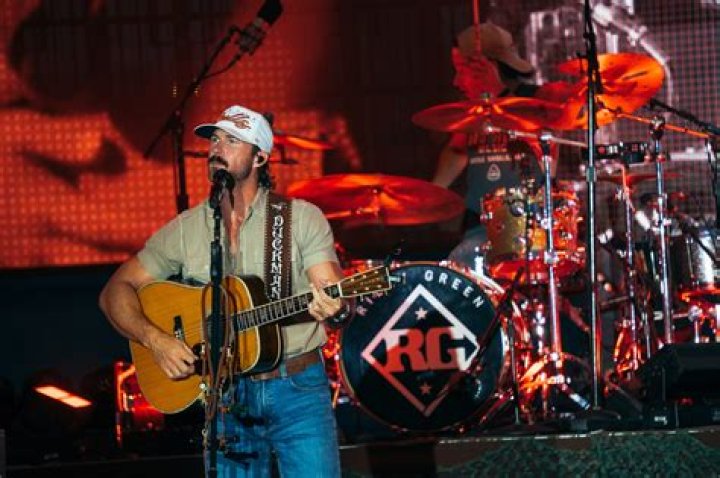 Riley Green Brings Music City to Belize for 'In Love By Now' Video